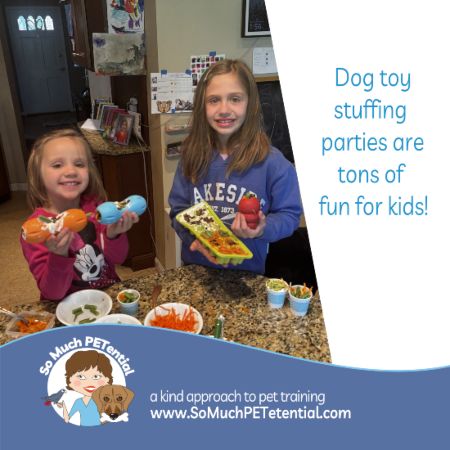 Have a family dog and kids? Dog toy stuffing parties are tons of fun for kids (and dogs!)

pictured:  two girls showing how they made food stuffed toys for their family dog using healthy food choices. 